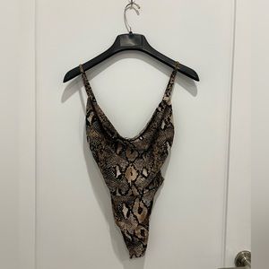 Snakeskin print velour body suit